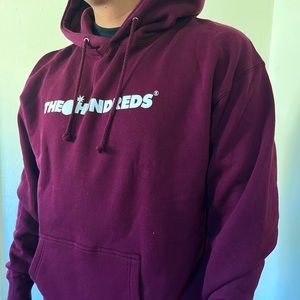 Maroon color hoodie with The Hundreds bar logo front and mini bomb back